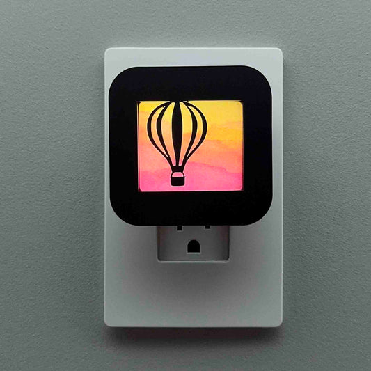 Hot Air Balloon Night Light with Sunset Background