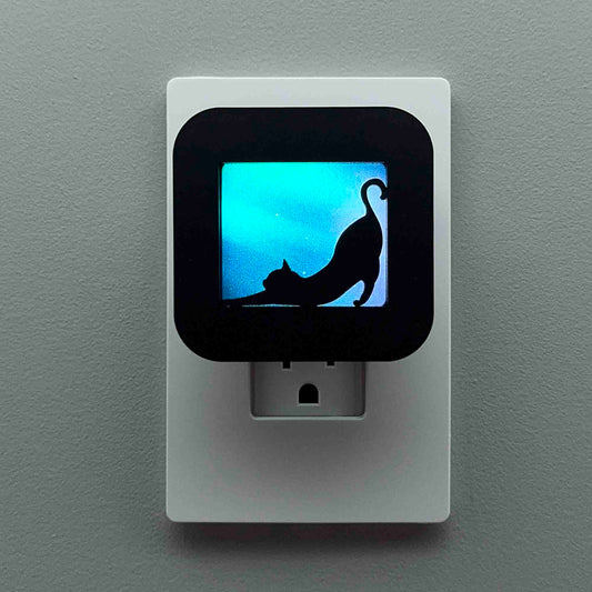Stretching Cat Night Light with Northern Lights Background